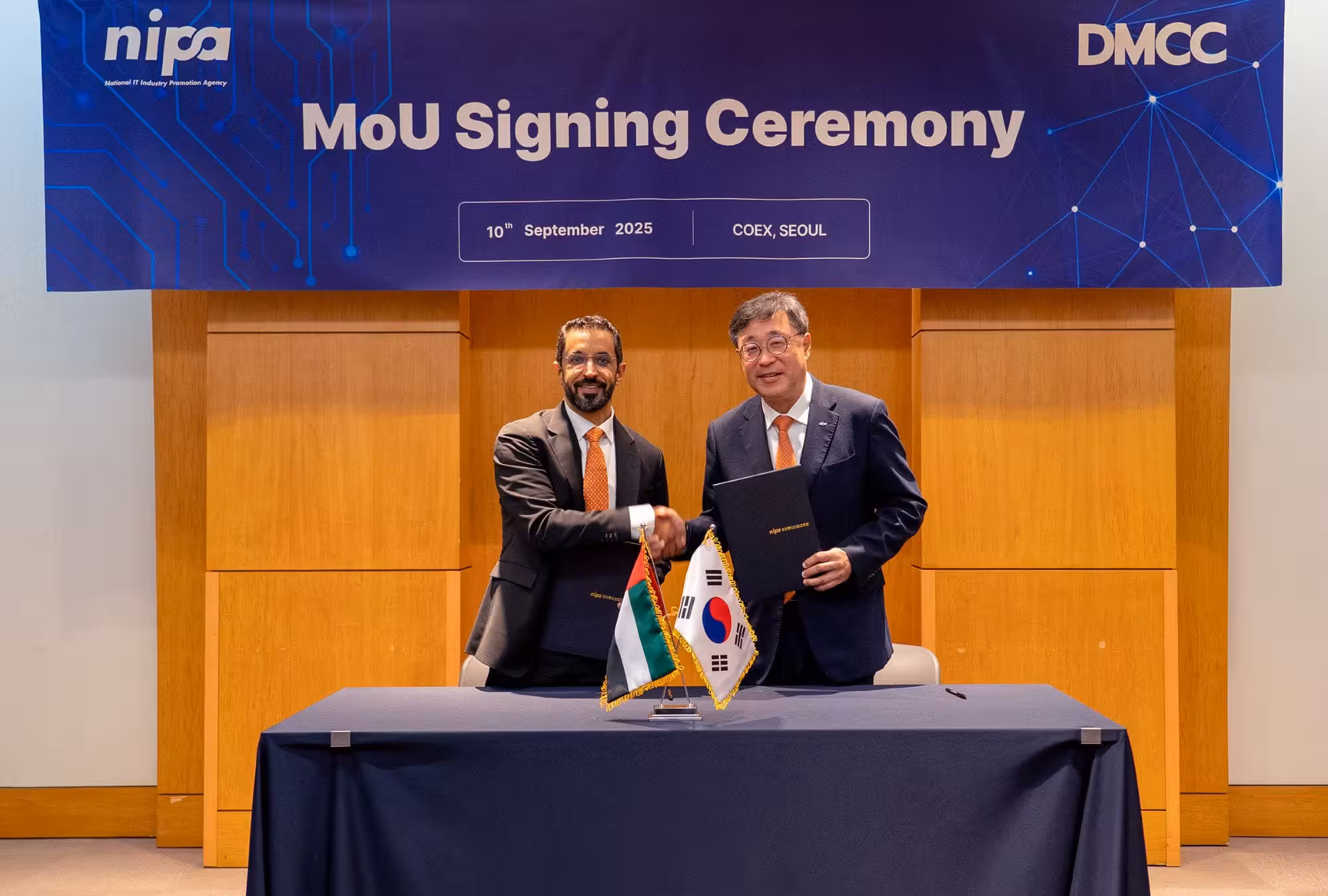 DMCC Korea AI partnership signing event in Seoul